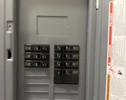 Electrical panel with more than six breakers and no single main disconnect